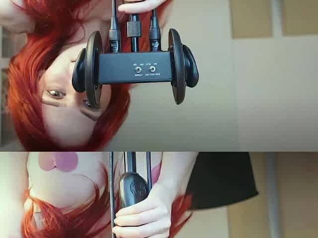 Redheaded pierced teen close up toy show