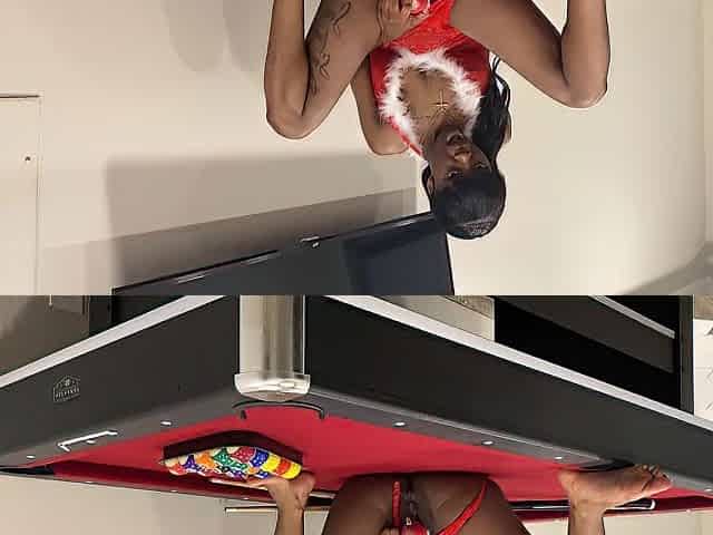 Black plays with her snatch on the pool table