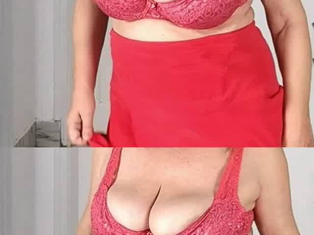 Mature Busty Stripping in Stockings