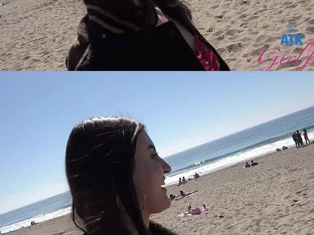A girl was having fun on the beach with her friend.