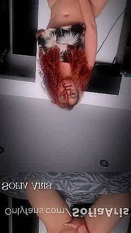 Colombian redhead rubs her vagina
