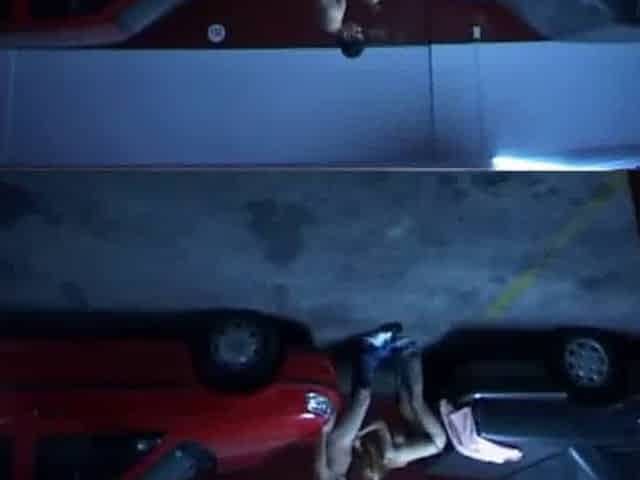 Busty blonde cheats in the garage on the car hood