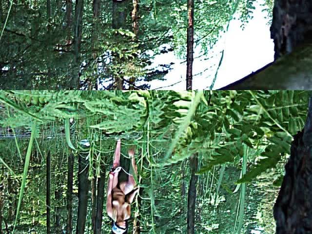 Legs spread for pissing in the woods