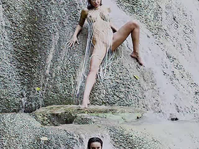 Monika Foxxx undressed posing against backdrop of waterfalls