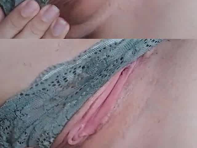 redhead satisfying herself