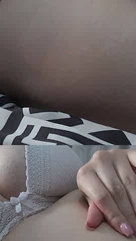 Latina Girl Plays with Her Belly and Navel with Her Fingers and Then Plays with It with a Paintbrush
