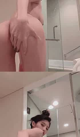 Asian slut spreading her ass