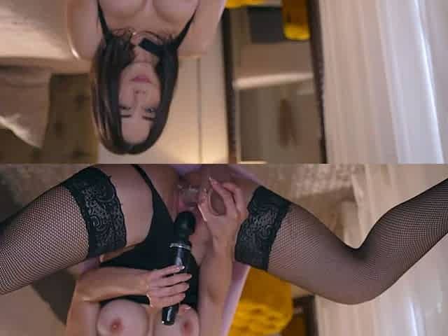 Busty babe playing with her big boobs