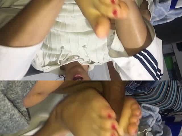My girlfriend in pajamas jerks me off with her hands and feet