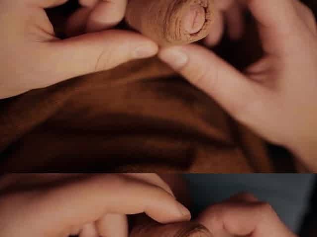 hunk with a large shlong playing with his foreskin in 4K