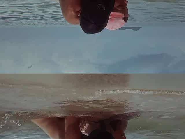 Sexy & risky sex in the sea waves on the beach