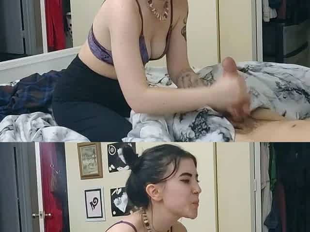 In a kitchen a sexy brunette playing with her big boobs