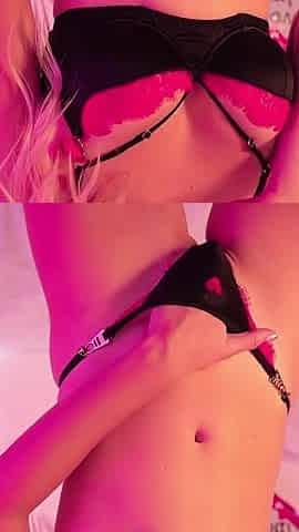 A Beauty in Romantic Lingerie Puts Her Hand Into Her Panties