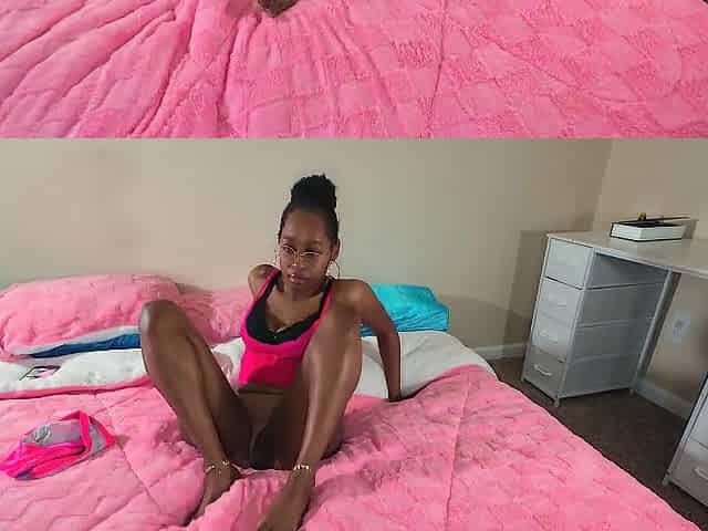 Black shows marvelous feet whilst playing with recent toy solo