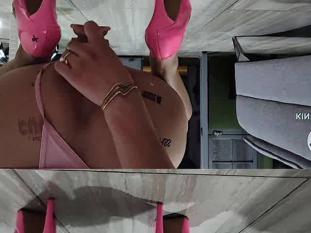 Sissy goes for an outdoors walk with a thrusting sex tool inside her butt