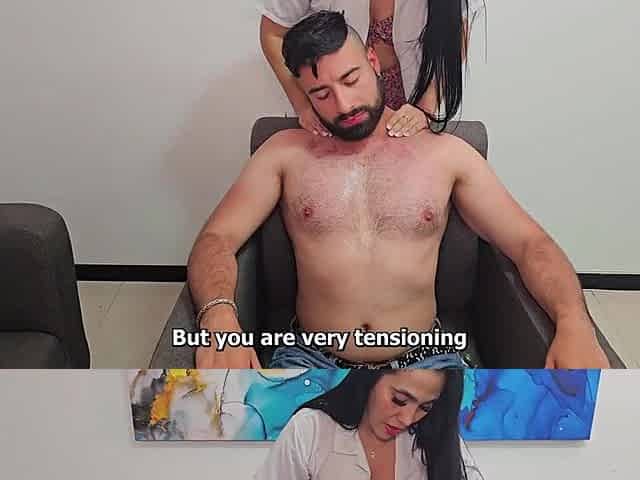 Physiotherapist relaxes his client with manual labor on his large white rod