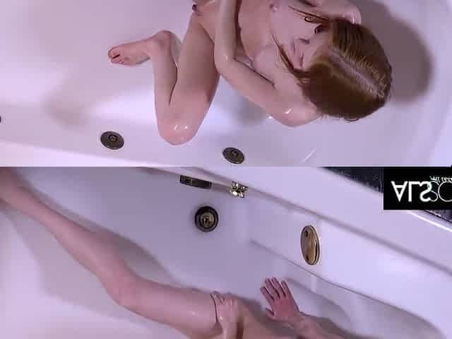Cute Redhead Fists Her Shaved Pussy To Climax