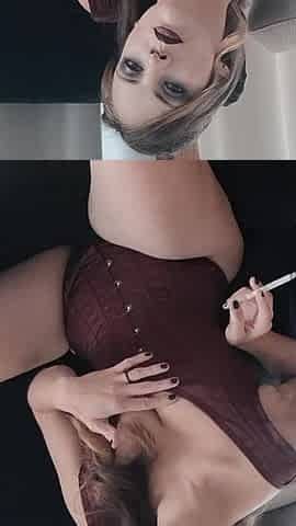 Smoking in Sexy Black Lingerie with Suspenders