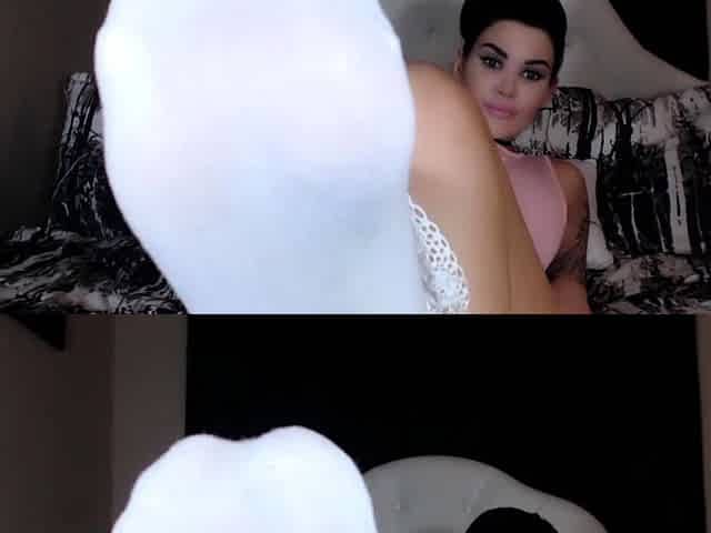 Brunette with foot fetish rubs big dick with her feet in POV