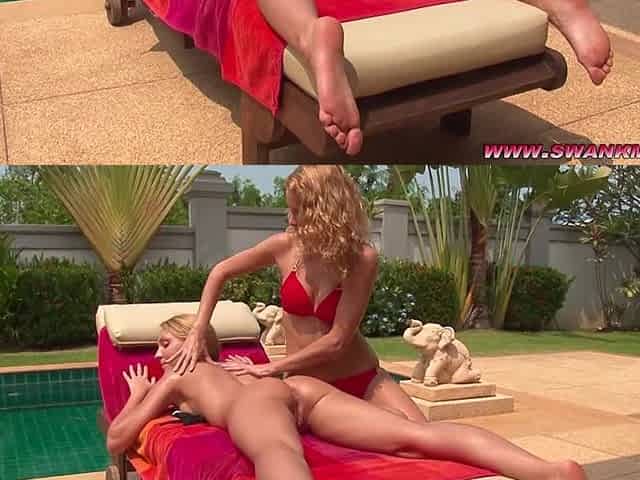 Two lesbian beauties have fun in the swimming pool.
