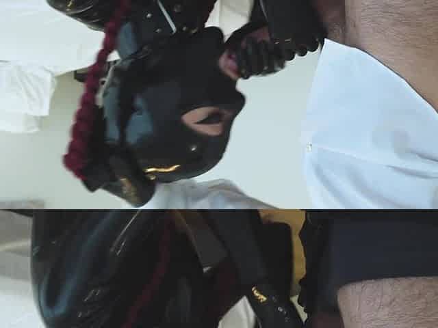 Latex sweetheart with nice-looking eyes sucks knob and gets load on face