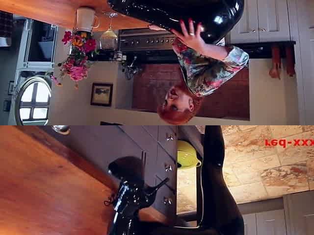 Red XXX screws herself with a toy during the time that in latex panties