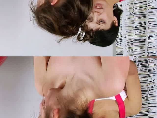 Two hot brunette lesbians fingering in bedroom