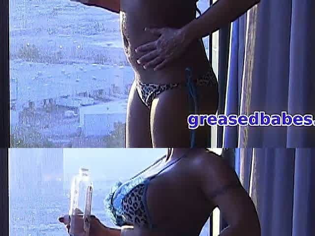 Golden-haired with Large Bazookas Removes Bikini and Gets Oiled Up