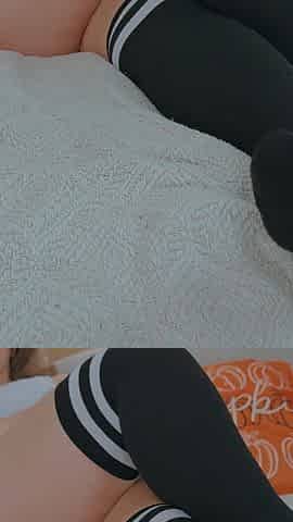 MILF with Big Thighs in Long Socks Masturbates While Watching Porn.