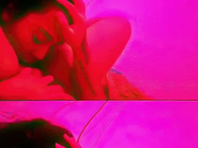 Eating her vagina below the pink light