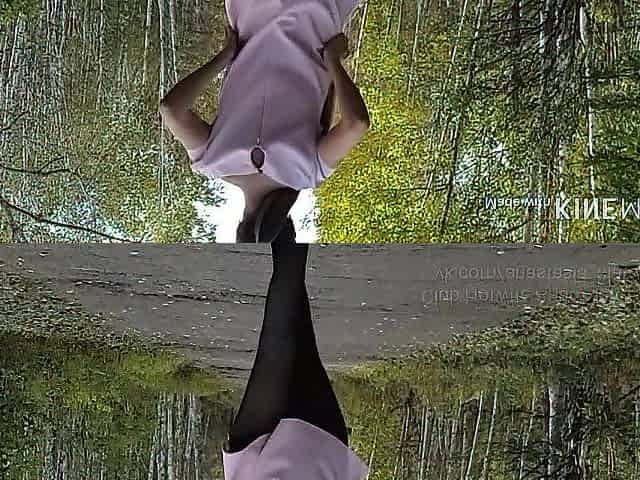 Walking in the park out of pants in a mini costume and showing snatch
