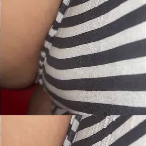 big beautiful woman masturbating with Remote over her shorts