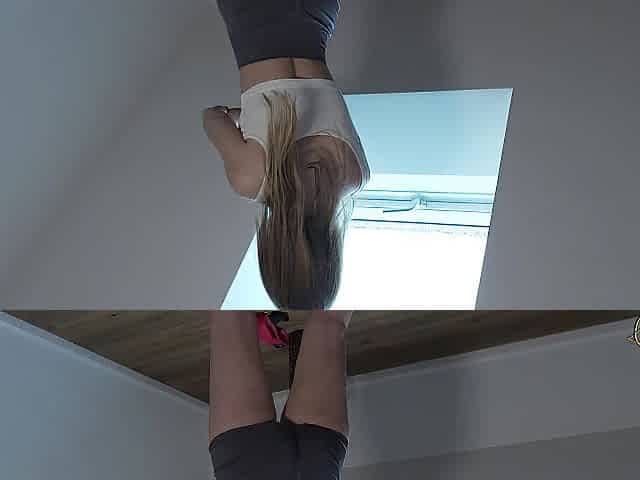Golden-haired bitch masturbates during training and squirts in her yoga panties