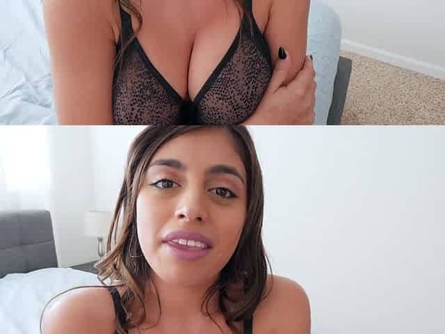 Busty babe playing with her big boobs