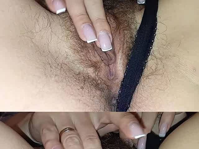 A pretty beauty masturbates her bushy vagina
