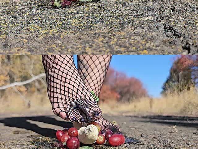 Emo hotty crushing fruit in fishnet clad feet