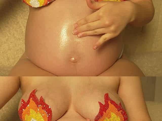 Stepsister Oils up Her Pregnant Big Belly and Plays with Her Belly While Getting Oily