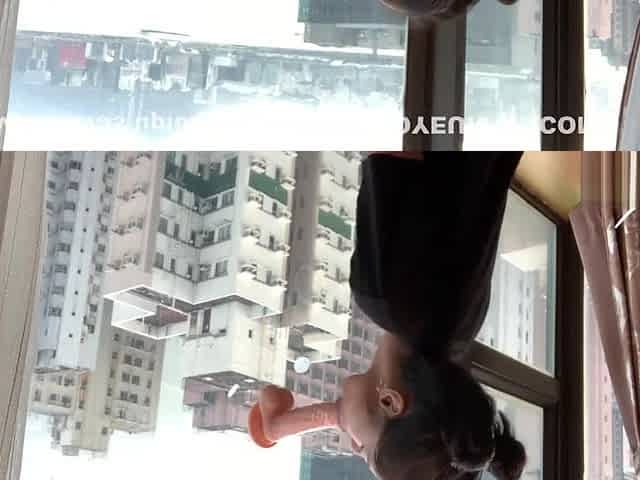 NAUGHTY DESI COLLEGE TEEN RIDES DILDO AGAINST HONG KONG SKYSCRAPER WINDOW