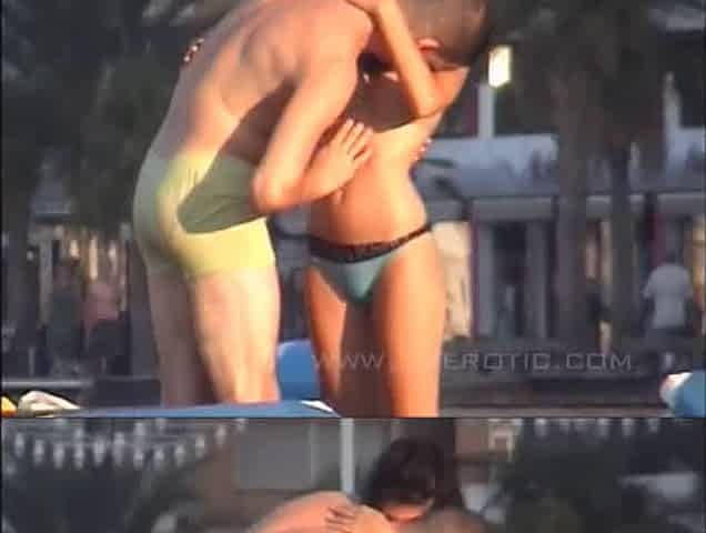 Horny Spanish brunette fucks standing right in the sea (real voyeur)