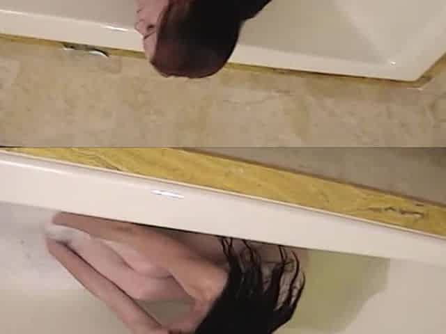 She Young and Horny Masturbating in the Bathtub.