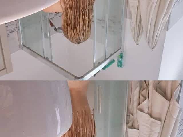 Excited blond shows her tits in the bath stall