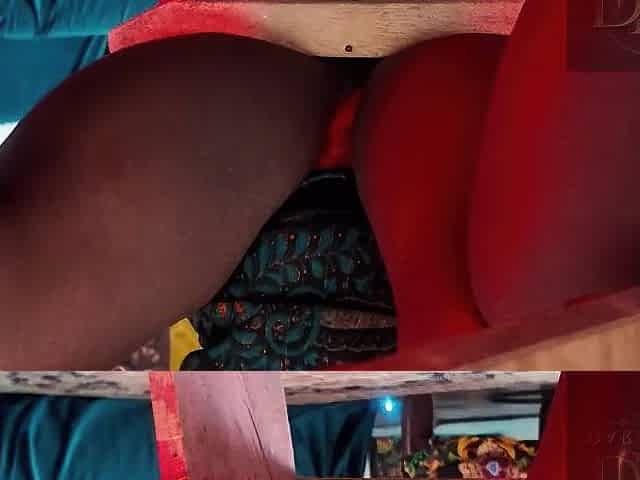 Black skinny thick woman flashes pants indooors