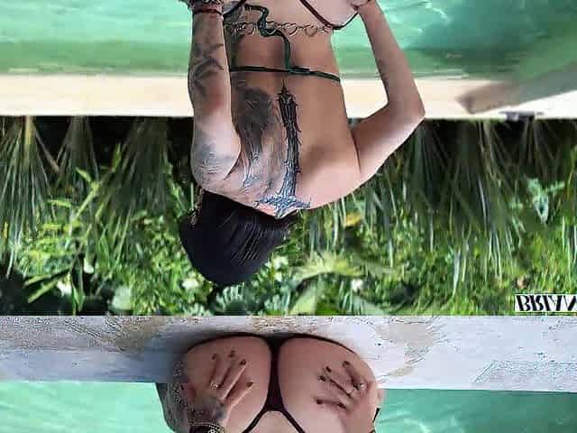 Pequitas is a hawt, tattooed Mexican woman who seduces Brian Evansx in the pool until they have sex