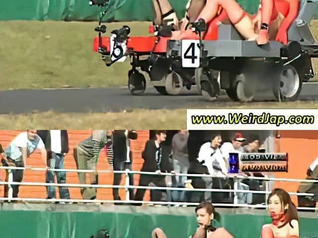 Asian chick on a racing dildo rides it around the race track