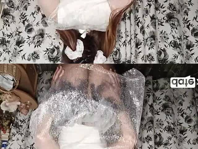 A ponytailed Oriental honey wearing a fairy suit uses a sex toy to enjoyment herself