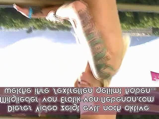 Golden-haired German tattooed floozy blows penis on balcony