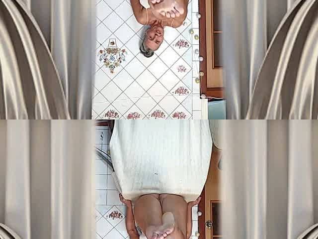 Hot Housewife Lukerya Teases with Her Hips and Feet in the Kitchen