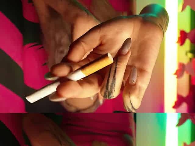 Hot Teen Smokin' a Cigarette and Shaking Her Breasts!