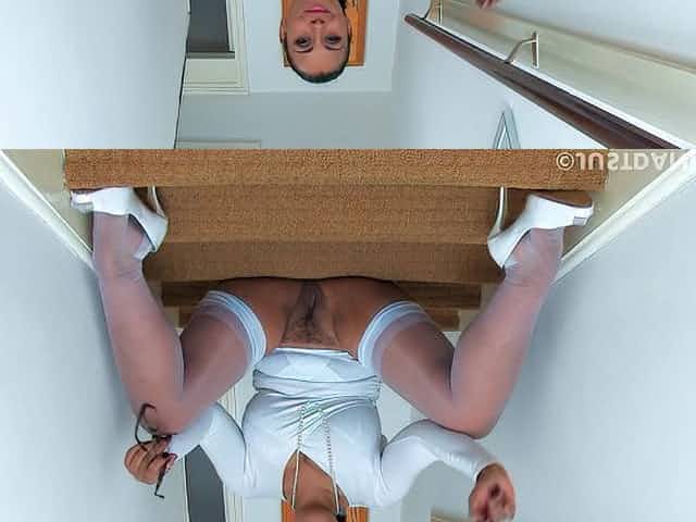 Foxy mature Danica Collins spreads her legs on the stairs to masturbate