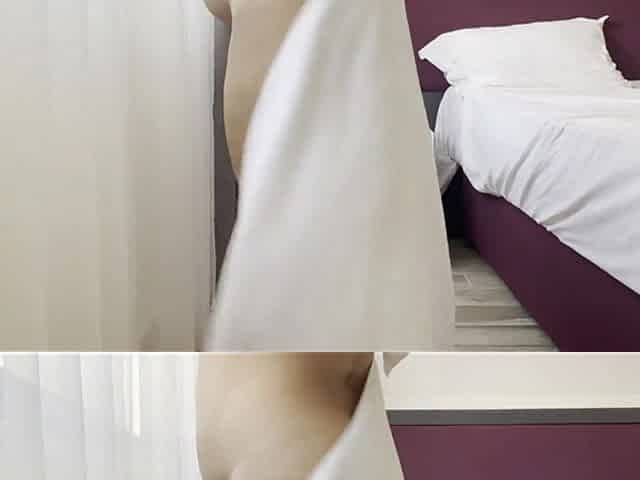 A Sexy Tourist at a Hotel After a Shower Got Aroused and Masturbated on the Balcony.